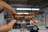 The biodegradable circuit board is made from natural fibres such as jute and flax, coated with a water-soluble resin.