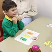 Charles in a speech and language therapy session.