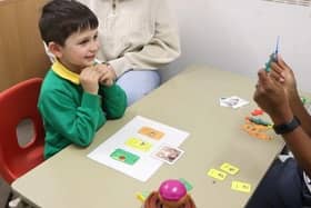 Charles in a speech and language therapy session.
