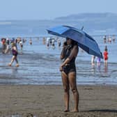 Scots are set to bask in the UK's hottest spring day of 2023. with the mercury expected to hit 25C on Wednesday -- but there will be a geographical divide, with the west expected to be as much as 10C warmer than eastern coasts. Picture: Lisa Ferguson