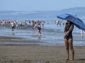 Scots are set to bask in the UK's hottest spring day of 2023. with the mercury expected to hit 25C on Wednesday -- but there will be a geographical divide, with the west expected to be as much as 10C warmer than eastern coasts. Picture: Lisa Ferguson