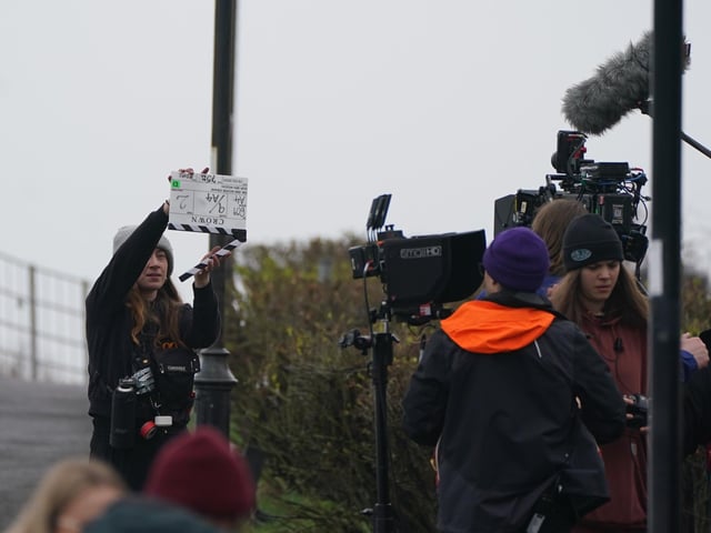 Cast and crew members on set as they film scenes for the next season of The Crown in St Andrews