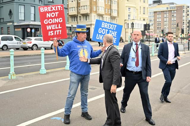 Security guards stop anti-Brexit activist Steve Bray approaching Keir Starmer (out of shot) during the 2021 Labour party conference in Brighton (Picture: Justin Tallis/AFP via Getty Images)