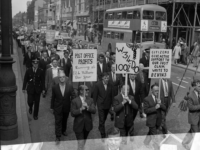 Striking postal workers on a protest march in Glasgow in July 1964.