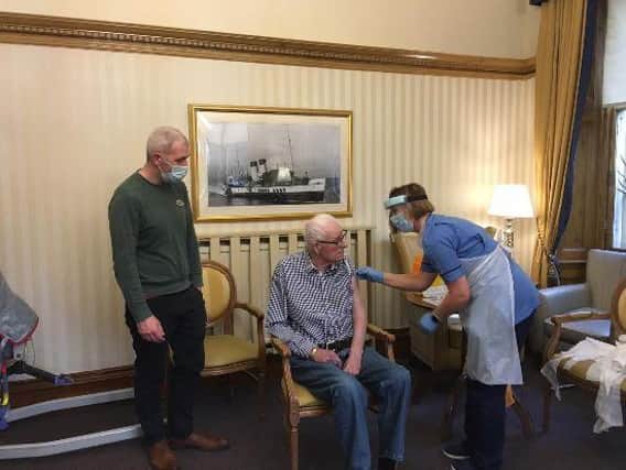 Frank Cooke, 71, was one of the first care home residents to receive the vaccination