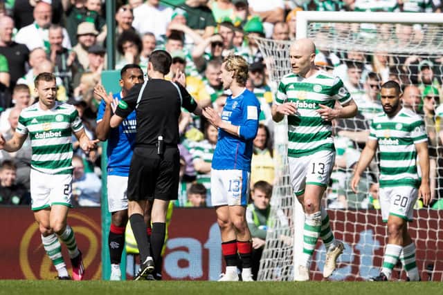 Alfredo Morelos protests his innocence after his goal is disallowed for a foul on Celtic's Alistair Johnston. (Photo by Alan Harvey / SNS Group)