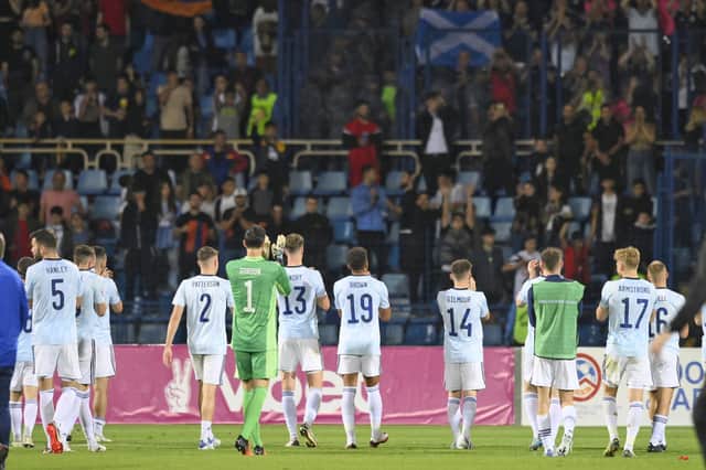 Scotland's players applaud to their fans at the end of the UEFA Nations League soccer match between Armenia and Scotland at the Vazgen Sargsyan stadium in Yerevan, Armenia, Tuesday, June 14, 2022. (AP Photo/Hakob Berberyan)