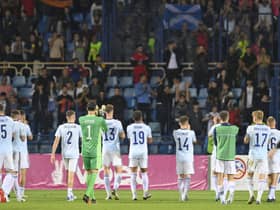 Scotland's players applaud to their fans at the end of the UEFA Nations League soccer match between Armenia and Scotland at the Vazgen Sargsyan stadium in Yerevan, Armenia, Tuesday, June 14, 2022. (AP Photo/Hakob Berberyan)