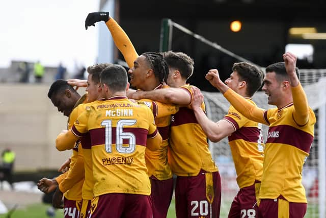 Motherwell's Moses Ebiye celebrates scoring to make it 3-2 against Dundee.