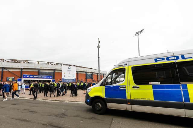 The Police make a barrier in front of the Rangers fans after an incident prior the Premier Sports Cup match against St Johnstone at Hampden. (Photo by Craig Williamson / SNS Group)
