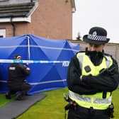 Officers outside the home of Nicola Sturgeon and Peter Murrell in 2023 as part of Operation Branchform. Picture: Andrew Milligan/Press Association