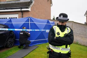 Police officers outside the home of Nicola Sturgeon and Peter Murrell as part of Operation Branchform.