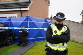 Officers outside the home of Nicola Sturgeon and Peter Murrell in 2023 as part of Operation Branchform. Picture: Andrew Milligan/Press Association