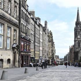 A virtually-deserted Royal Mile last summer.