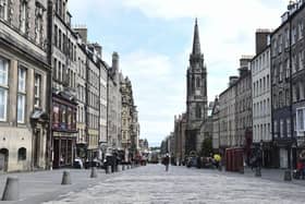 A virtually-deserted Royal Mile last summer.