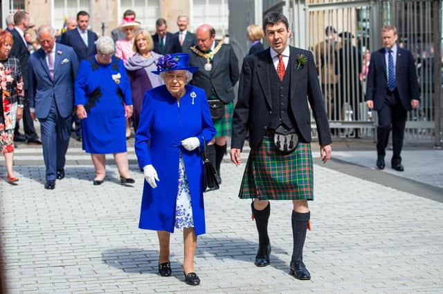 The Presiding Officer of the Scottish Parliament, Ken Macintosh, seen greeting Queen Elizabeth in 2019,  has the power to postpone May's election for six months but would probably want to have widespread political backing for the decisions (Picture: Duncan McGlynn/Scottish Parliament)