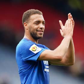Rangers' Cyriel Dessers applauds the fans after booking a spot in the Scottish Cup final.