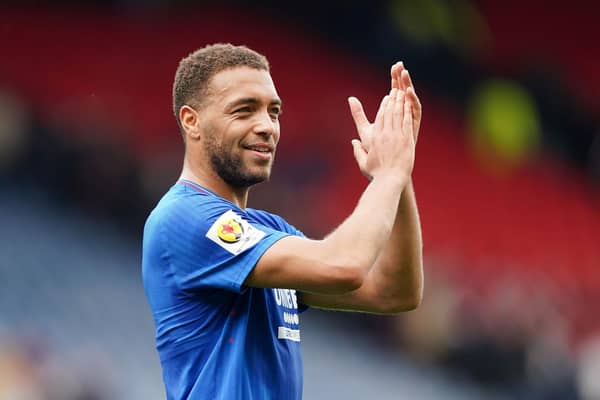 Rangers' Cyriel Dessers applauds the fans after booking a spot in the Scottish Cup final.