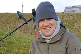 Metal detectorist Christopher Squires said he made a "find of a lifetime" with his discovery of a patterned Bronze Age axe at an undisclosed location in the Central Belt. PIC: Contributed.