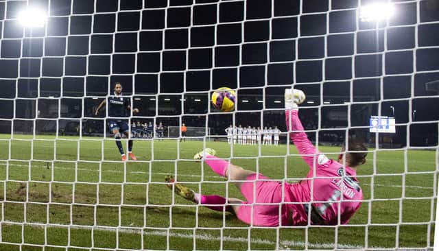 St Mirren's Trevor Carson saves a penalty from Dundee's Kwame Thomas during the Scottish Cup shoot-out win. (Photo by Alan Harvey / SNS Group)