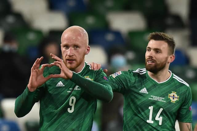 Hearts striker Liam Boyce, left, will not be on international duty due to family reasons.