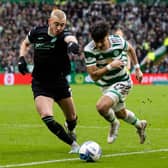 Hibs defender Lewis Miller challenges Celtic's Jota during the match in Glasgow.  (Photo by Alan Harvey / SNS Group)