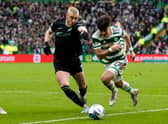 Hibs defender Lewis Miller challenges Celtic's Jota during the match in Glasgow.  (Photo by Alan Harvey / SNS Group)