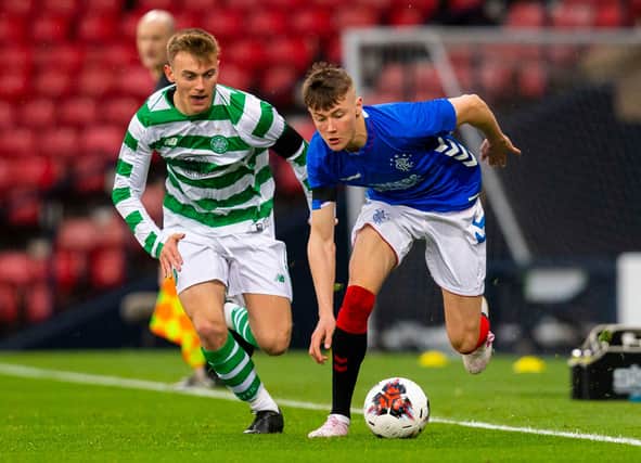 Celtic's Brody Paterson (left) competes with Rangers' Nathan Patterson - could similar be coming to the Lowland League? (Picture: SNS)