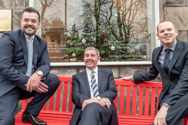 Stuart Pender, David Alexander and Andrew Seldon, pictured after agreeing the deal.