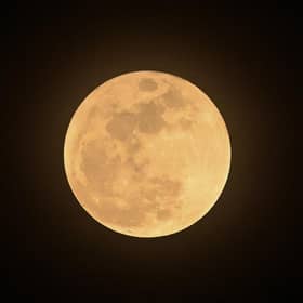 The moon is believed to have been created after a massive collision between the Earth and a Mars-sized object (Picture: Roslan Rahman/AFP via Getty Images)