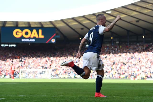 One of the great moments in Auld Enemy clashes, Leigh Griffiths celebrating the second of his free-kick goals in 2017 which could have, should have, brought us victory