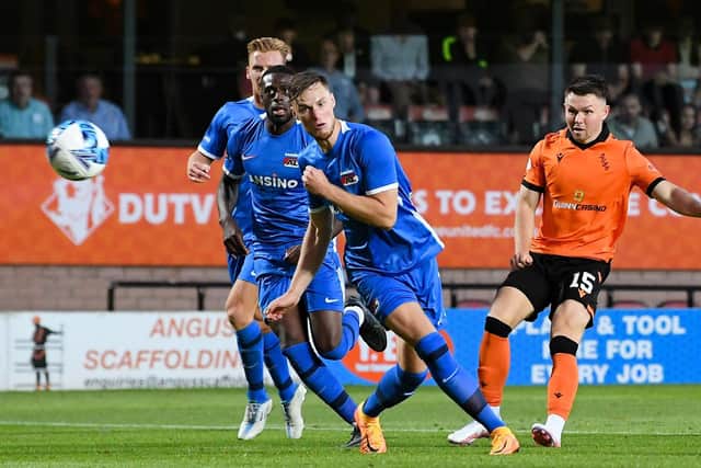 Glenn Middleton curls the ball home to make it 1-0 to Dundee United against AZ Alkmaar.