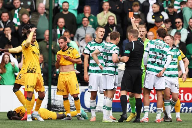 Joe Hart is shown a red card by referee John Beaton during Livingston v Celtic in September last year.