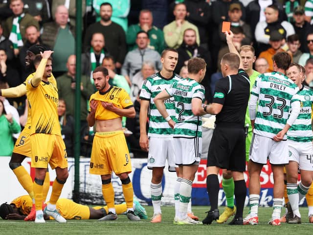 Joe Hart is shown a red card by referee John Beaton during Livingston v Celtic in September last year.