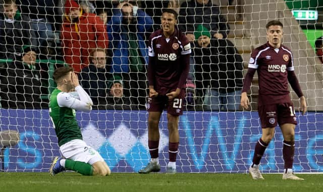 Hearts' Toby Sibbick celebrates after he blocks Hibs' Josh Campbell's shot n the line at the end of the goalless draw at Easter Road. (Photo by Ross Parker / SNS Group)