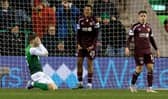 Hearts' Toby Sibbick celebrates after he blocks Hibs' Josh Campbell's shot n the line at the end of the goalless draw at Easter Road. (Photo by Ross Parker / SNS Group)