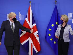 Boris Johnson is welcomed by European Commission President Ursula von der Leyen in the Berlaymont building at the EU headquarters in Brussels