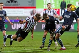 Lewis McCann heads home Dunfermline's equaliser.