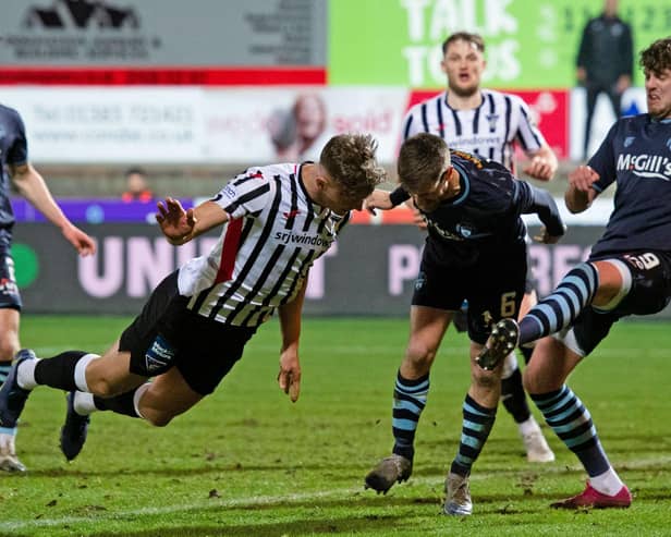 Lewis McCann heads home Dunfermline's equaliser.