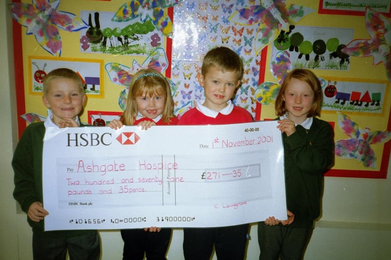 School children present cheque to Ashgate hospice