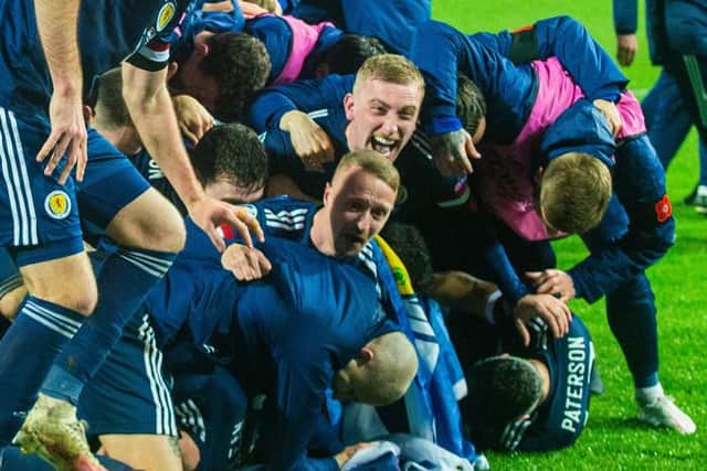 Scotland's players celebrate the winning penalty during the UEFA Euro 2020 Qualifier between Serbia and Scotland at the Stadion Rajko Mitic(Photo by Nikola Krstic / SNS Group)