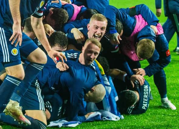 Scotland's players celebrate the winning penalty during the UEFA Euro 2020 Qualifier between Serbia and Scotland at the Stadion Rajko Mitic(Photo by Nikola Krstic / SNS Group)