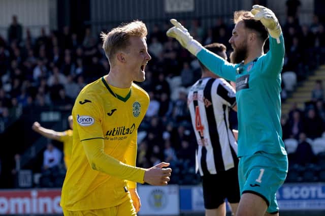 Hibs midfielder Ewan Henderson celebrates his goal at the SMiSA Stadium