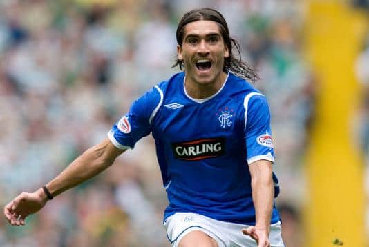 Pedro Mendes celebrates his goal in a 4-2 win over Celtic in August 2008.