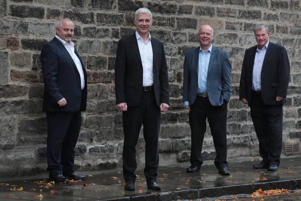 Left to right are Stephen Paterson, Kevin Boyd, Scott Carnegie and Graham Langley, Quest Corporate, the Edinburgh-based corporate finance firm founded in 2000. Picture: Stewart Attwood