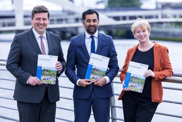 Independence Minister Jamie Hepburn, First Minister Humza Yousaf and Deputy First Minister Shona Robison unveiling one of the Scottish Government's independence papers. Image: Robert Perry/Press Association.
