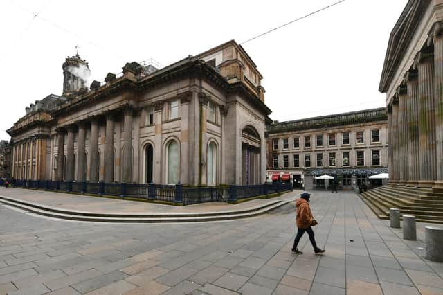 Empty streets in central Glasgow after the city entered a tier-4 lockdown tell a story about the impact of the restrictions on businesses (Picture: John Devlin)