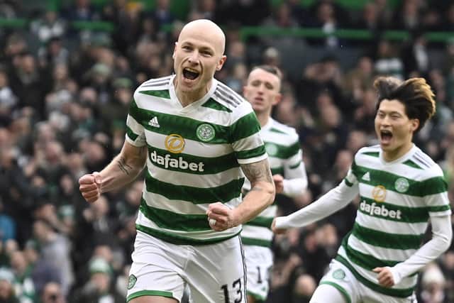 Aaron Mooy celebrates after scoring Celtic's opener from the penalty spot. (Photo by Rob Casey / SNS Group)