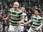 Aaron Mooy celebrates after scoring Celtic's opener from the penalty spot. (Photo by Rob Casey / SNS Group)