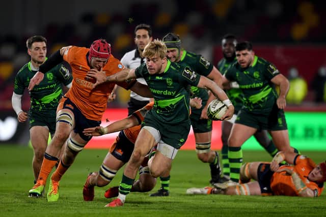 Ollie Hassell-Collins of London Irish breaks through the Edinburgh defence. (Photo by Tom Dulat/Getty Images)